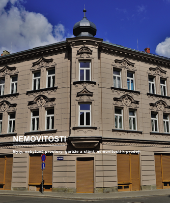 obrázek budovy s nápisem nemovitosti - Byty, nebytové prostory, garáže a stání, nemovitosti k prodeji
